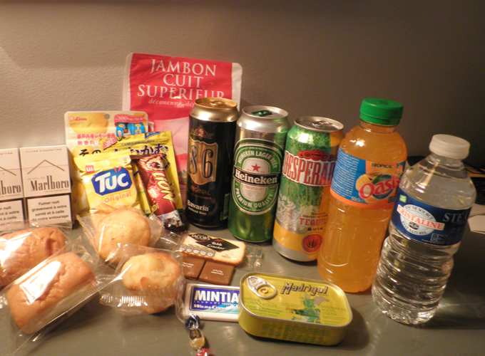The snacks and drinks which I bought from the store. The snacks and drinks which I bought from the store.